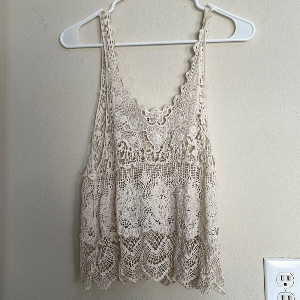 Women’s tank fits like a small - super cute!